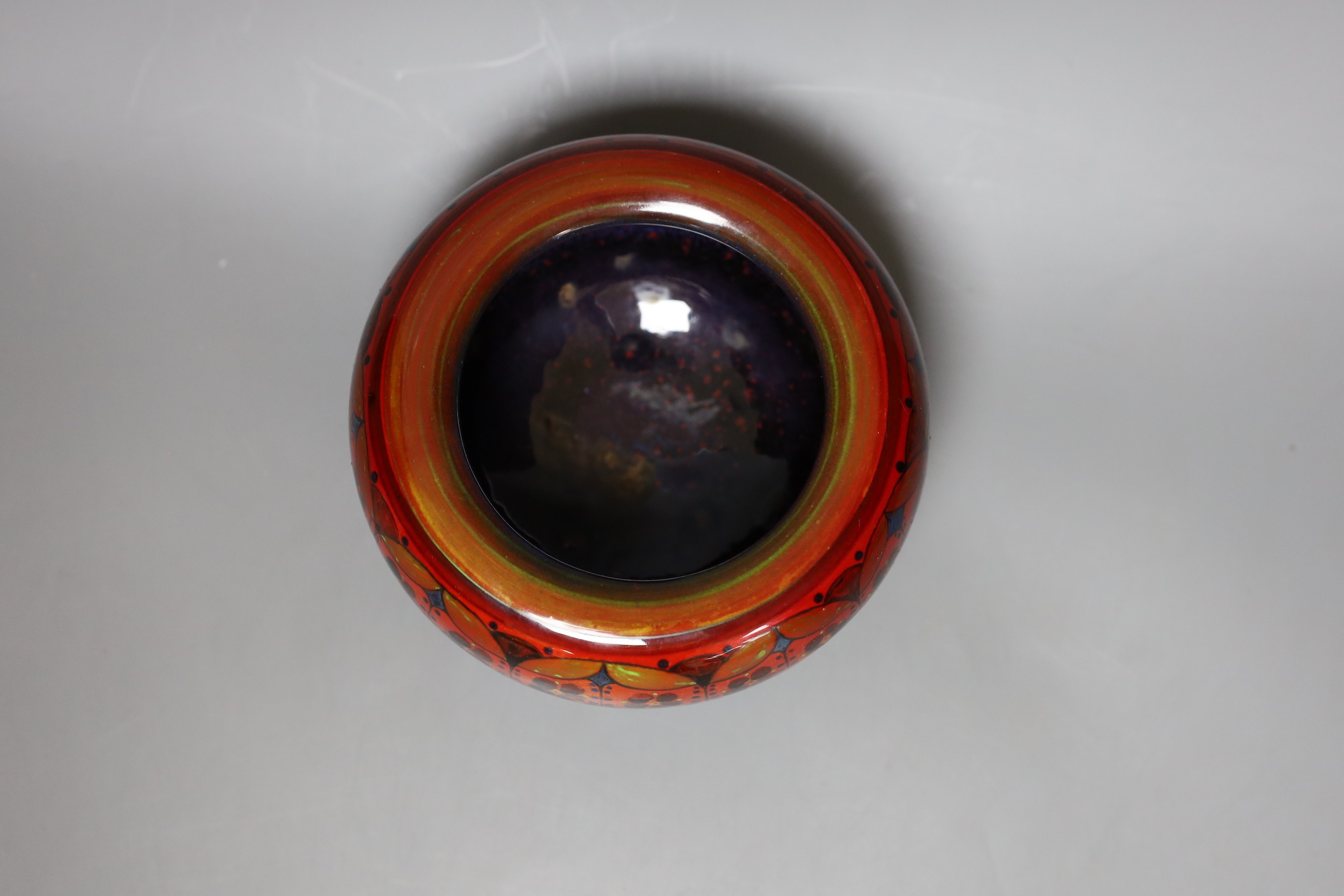 A Doulton Flambé Sung bowl with floral motif, 9cm tall